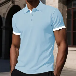 Close-up of light blue textured knit polo shirt featuring white collar accents and soft fabric