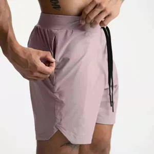 Detail view of men's quick-dry sports shorts showing the side pocket and fabric