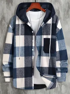 Close-up view of men's blue and white plaid hooded shirt with flannel texture and contrast hood