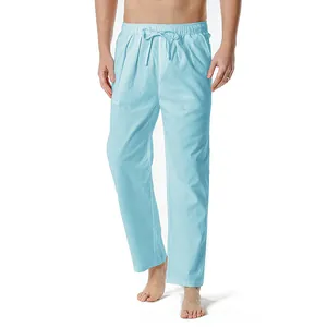 Detail view of men's light blue cotton linen casual trousers with drawstring waist