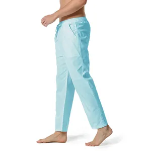 Side detail view of sky blue men's linen casual cropped pants with drawstring waist