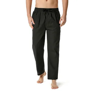 Detailed view of men's black cotton linen casual pants with elastic drawstring waist