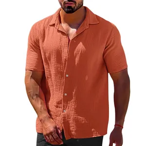 Detailed view of terracotta orange crinkle texture on men's short sleeve casual button shirt