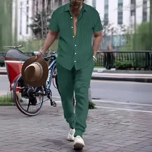 Close-up look of a stylish men's green vertical striped shirt and long pants set.