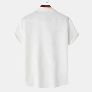 Back view of men's white short sleeve shirt featuring vertical jacquard texture