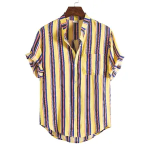 Detailed view of a yellow Hawaiian shirt with vertical stripes and a front pocket