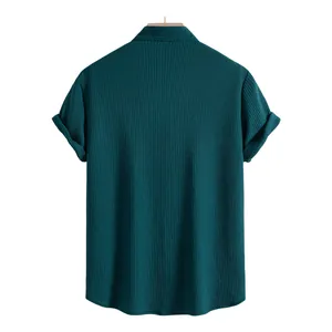 Detailed back view of men's dark teal short sleeve casual shirt with vertical textured fabric