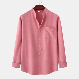Close-up of a men's coral pink cotton linen shirt featuring a stand collar and pocket.