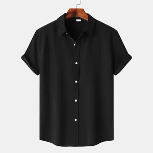 Close-up of black men's short-sleeve shirt featuring a unique jacquard texture