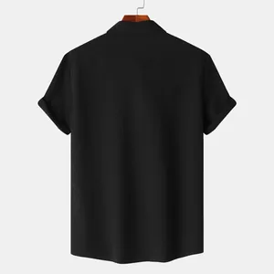 Back view of a men's black short-sleeved jacquard shirt showing fabric texture