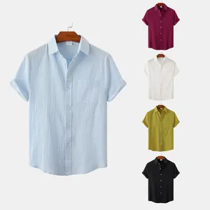 Color palette of men's linen short sleeve shirts with front pocket on wood hangers