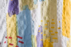 Close-up macro view of abstract colorful pattern on men's summer casual shirt fabric detail