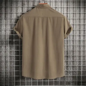 Back view detail of a men's casual solid color short-sleeved shirt in brown texture