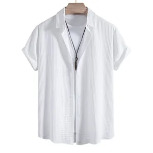 Men's white short-sleeve shirt featuring a unique waffle texture and button-up front