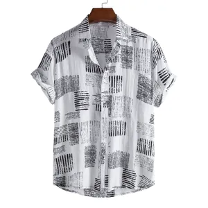 Macro view of white short-sleeved casual shirt featuring artistic black abstract linear patterns