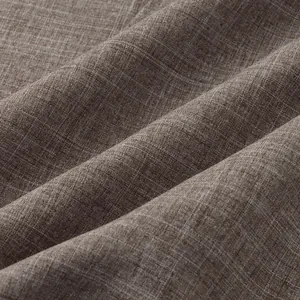 Vista macro detallada de la tela de camisa de algodón y lino marrón con textura de tejido