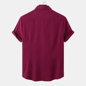 Macro view of men's burgundy linen short sleeve shirt showing clean back tailoring