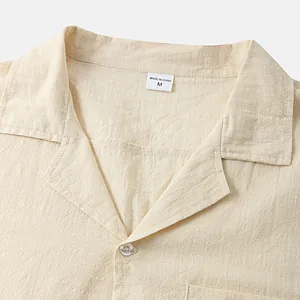 Detailed macro view of a breathable cotton linen men's shirt collar showing size tag