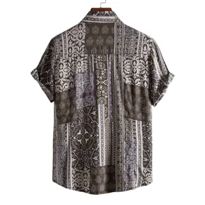 Detailed back view of a men's short-sleeve shirt with ethnic floral patchwork prints
