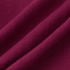 Macro view of high-quality magenta cotton linen fabric texture for men's shirt