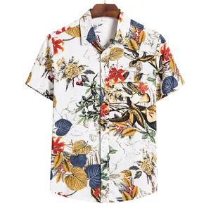 Detail of men's Hawaiian shirt featuring a vibrant tropical floral print on white fabric