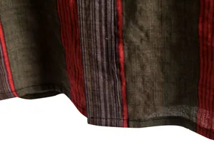 Close-up detail of striped linen fabric hem on men's casual short sleeve shirt