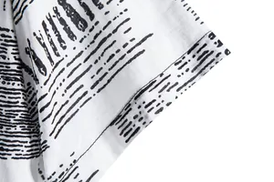 Close-up detail of casual short-sleeved shirt sleeve hem showing high-quality stitching