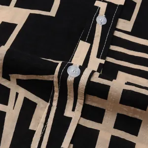 Detailed macro view showing the geometric grid pattern and buttons of this men's slim fit shirt