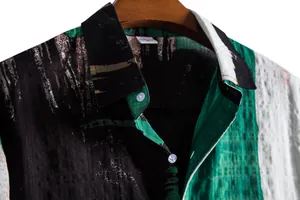 Close-up of linen-textured men's casual floral shirt collar with button details
