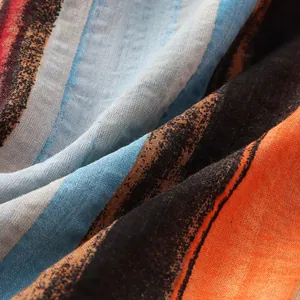 Macro detail showing the texture of striped cotton linen fabric for summer shirts.