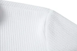 Close-up of white men's shirt showing high-quality waffle texture fabric.