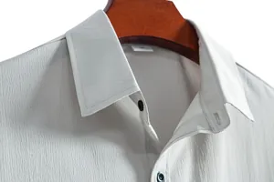 Close-up of men's casual shirt collar showing unique crinkled fabric texture