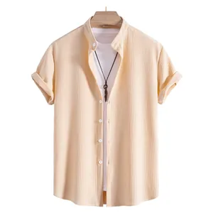 Men's casual short sleeve shirt featuring textured fabric and a sleek mandarin collar