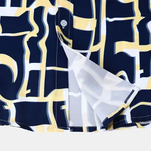 Gros plan sur l'imprimé géométrique abstrait d'une chemise hawaïenne pour homme