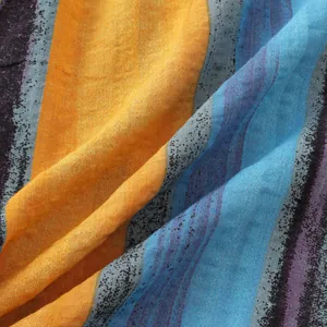 Close-up detail of breathable cotton linen fabric with colorful vertical stripes pattern
