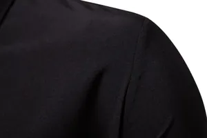 Close-up of the shoulder seam and fine fabric texture on a black men's casual shirt