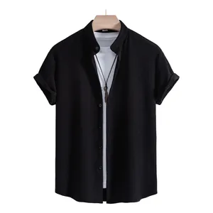 Detailed view of men's casual black short-sleeved shirt with textured waffle fabric