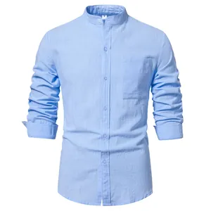 Detailed macro view of a light blue men's cotton linen shirt featuring a stylish mandarin collar.