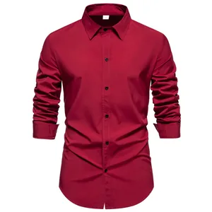 Detailed view of a burgundy men's long-sleeved casual shirt with black buttons.