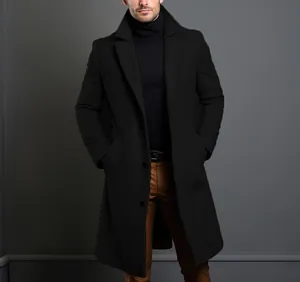 Manteau classique en laine noire pour homme avec un design mi-long minimaliste élégant.