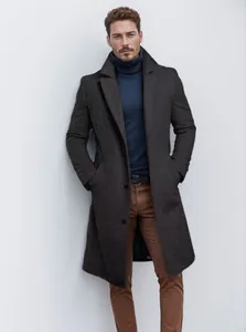 Detailed macro view of a men's mid-length wool coat in a classic charcoal grey finish.