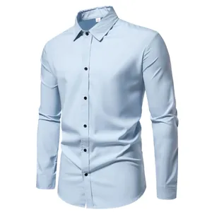 Detailed view of a light blue men's long-sleeve casual shirt with contrasting black buttons