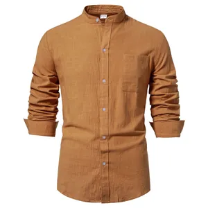 Detail of men's ochre cotton linen shirt with mandarin collar and chest pocket
