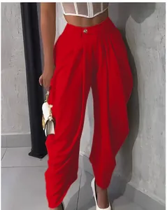 Elegant red high-waisted pleated balloon pants for women in a trendy street style