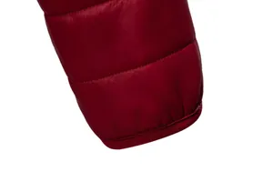 Wine red puffer jacket sleeve cuff detail with elastic ribbing and quilted texture