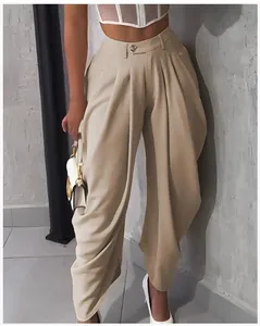 Detailed view of women's khaki high-waisted pleated tulip trousers with elegant drape