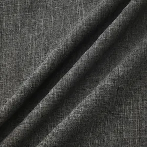 High-resolution close-up of dark grey cotton linen fabric texture showing slub weave detail