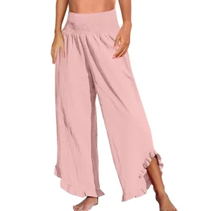 Detailansicht der pinkfarbenen Baumwoll-Leinen-Hose mit hohem Bund und Rüschensaum