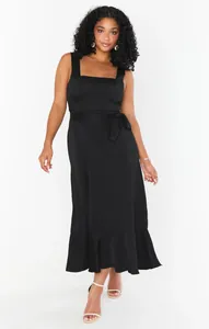Elegant black square neck midi dress with tie waist and ruffled hem detailing