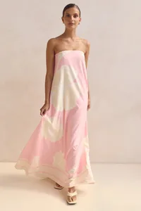 Elegant pink strapless maxi dress featuring a large cream floral print for summer